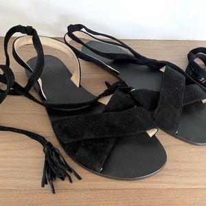 J Crew black flat sandals with suede wrap ankle.